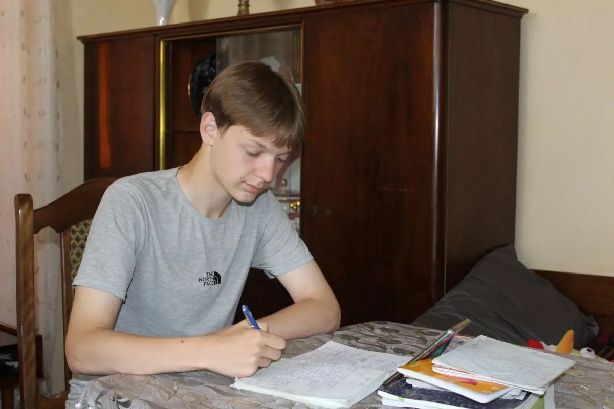 Kolya is attending online tutoring classes_ASB Georgia.webp
